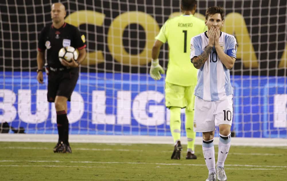 Argentina's Lionel Messi reacts after missing his shot