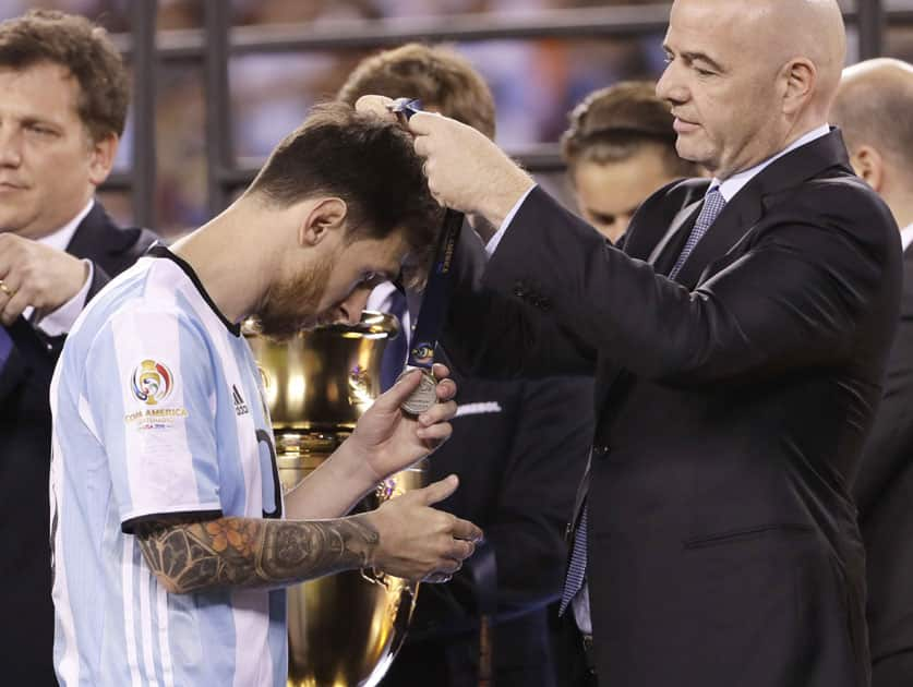 Argentina's Lionel Messi receives his medal after the Copa America Centenario championship