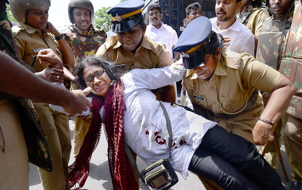 Police detain the Youth Congress members during their protest