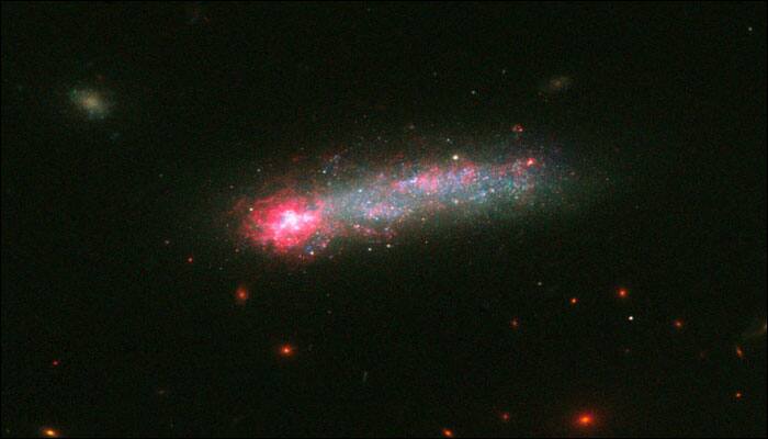 Galaxy celebrates star-birth; NASA&#039;s Hubble captures skyrocket-like display! - See pic