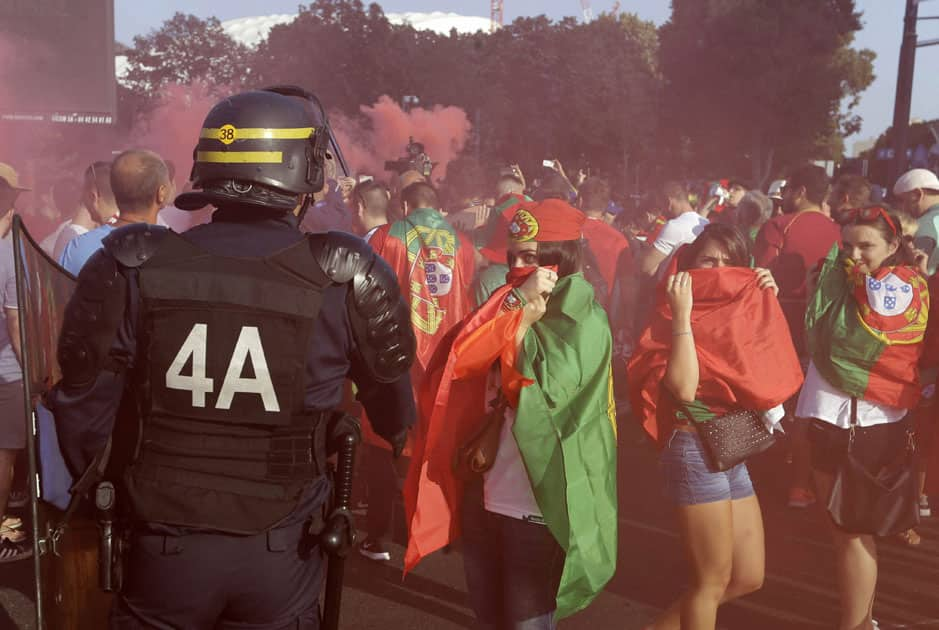 fans hold flares prior the Euro 2016 quarterfinal match between Poland and Portugal