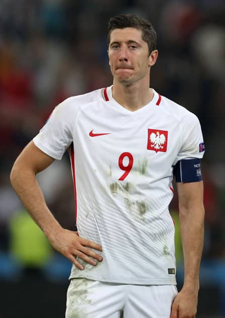 Robert Lewandowski reacts at the end of quarterfinal match