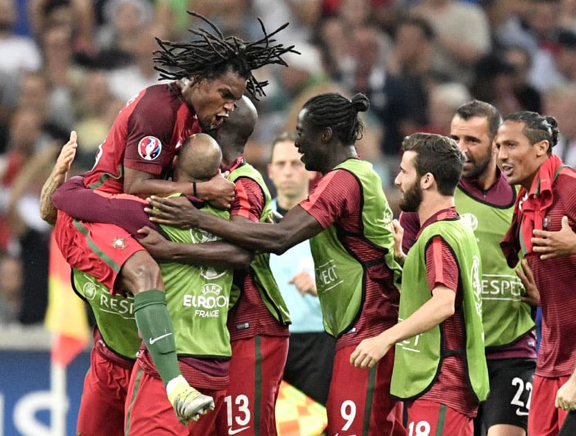 Portugal's Renato Sanches, left, celebrates with his teammates