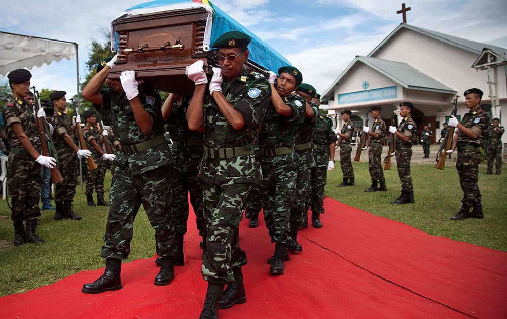 Soldiers of the NSCN (IM) carry the coffin of their Chairman Isak Chishi Swu