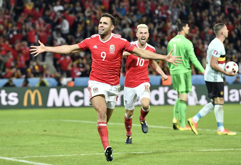 Hal Robson Kanu, left, celebrates after scoring his side’s second goal