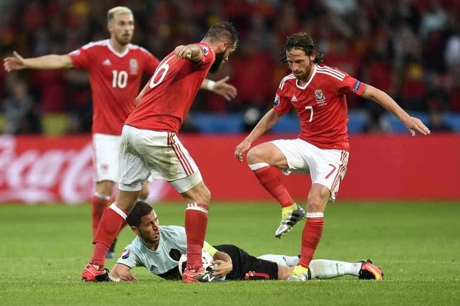 Belgium's Eden Hazard falls on the pitch