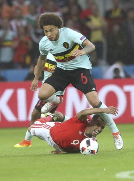 Axel Witsel, top, challenges for the ball with Wales' Hal Robson Kanu