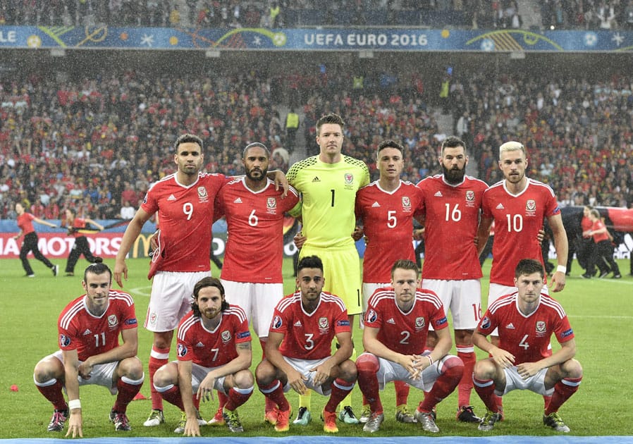 Wales players pose for photos before the Euro 2016 quarterfinal match