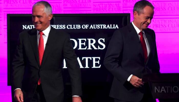 Australians swing against ruling coalition in knife-edge election