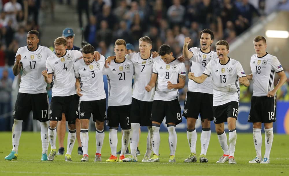 The German team celebrate during the penalty shootout