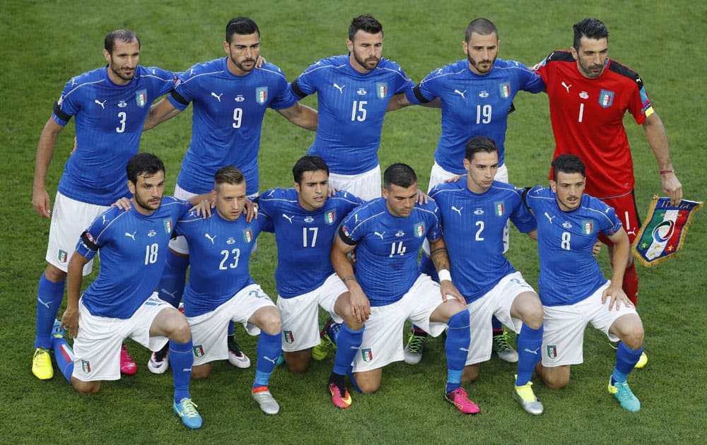 Italy players pose for photographers prior to the start