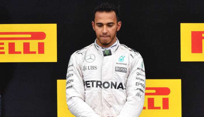 Austrian Grand Prix: Triumphant Lewis Hamilton booed after collision with Mercedes team mate Nico Rosberg
