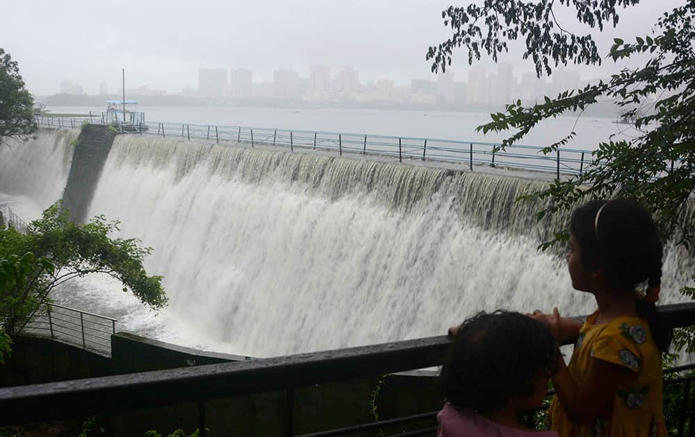 A view of Powai lake overflow during the continue rain.