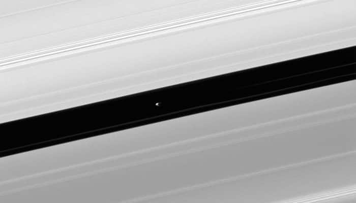 Pandemonium! Saturn&#039;s moon Pan and rings as seen from Cassini spacecraft (See pic)