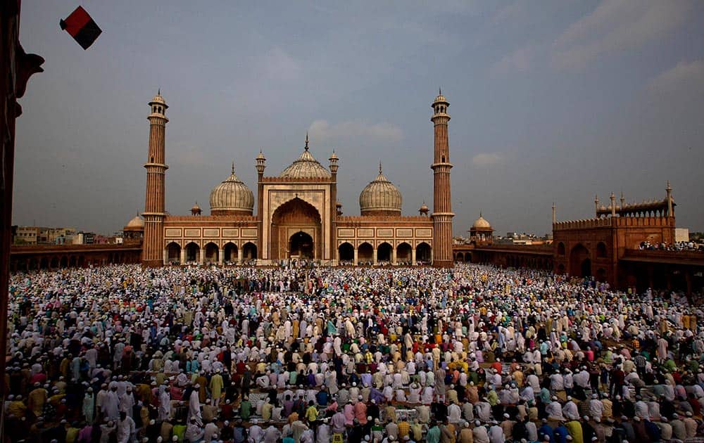 Muslims offer Eid al-Fitr prayers