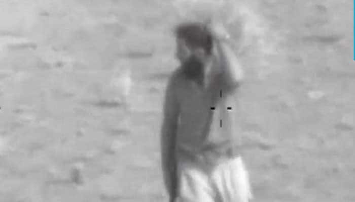 Must watch video! ISIS fighter puts grass on his head to hide from Iraqi choppers