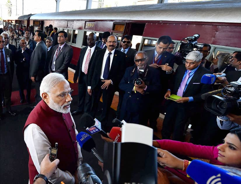 Narendra Modi speaks to the press