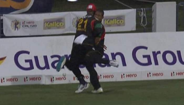 VIDEO: NASTY! Ambulance called after shocking head clash between fielders in CPL