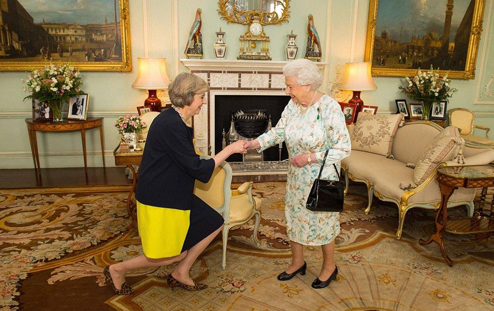 Queen Elizabeth II welcomes Theresa May