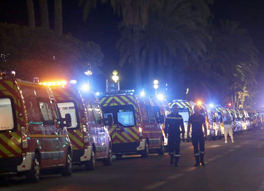 Ambulances line up near the scene of an attack