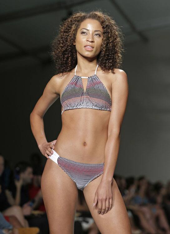 A model shows off her Just Bones Boardwear, Ocean Collection swimwear in Miami