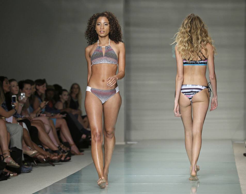 Models shows off their Just Bones Boardwear, Ocean Collection swimwear