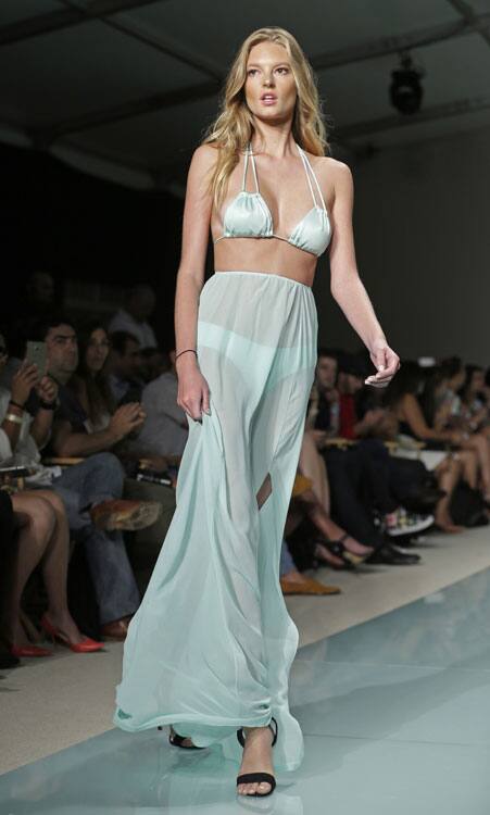 A model shows off her Du Aqua, Debut Lux Collection swimwear during Miami Swim Week