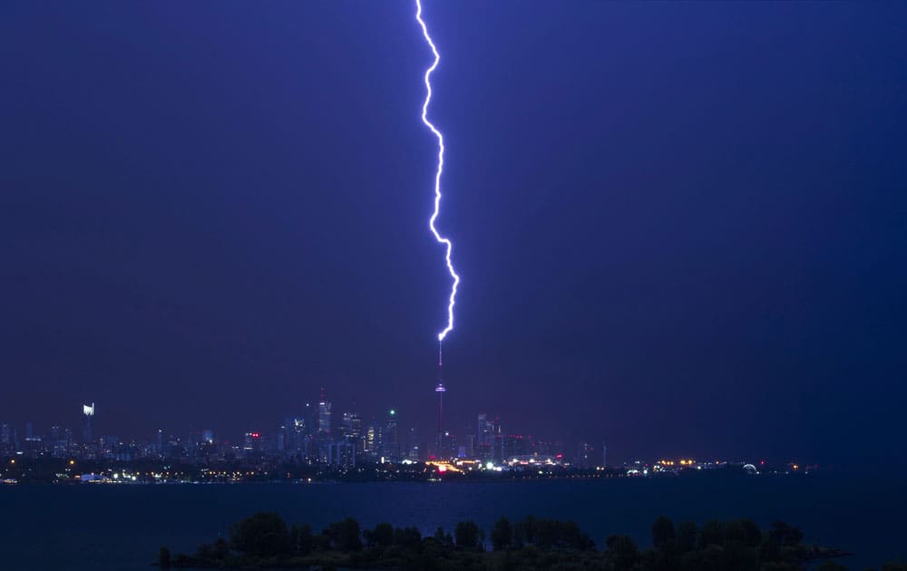 A lightning bolt strikes the CN Tower during an electrical storm in Toronto