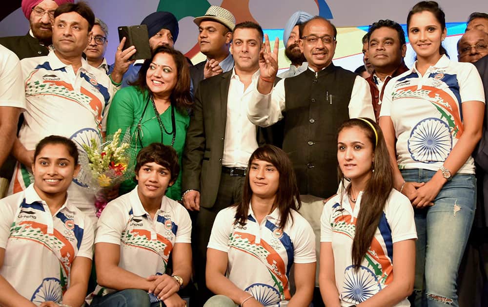 Sports minister with Rio bound players