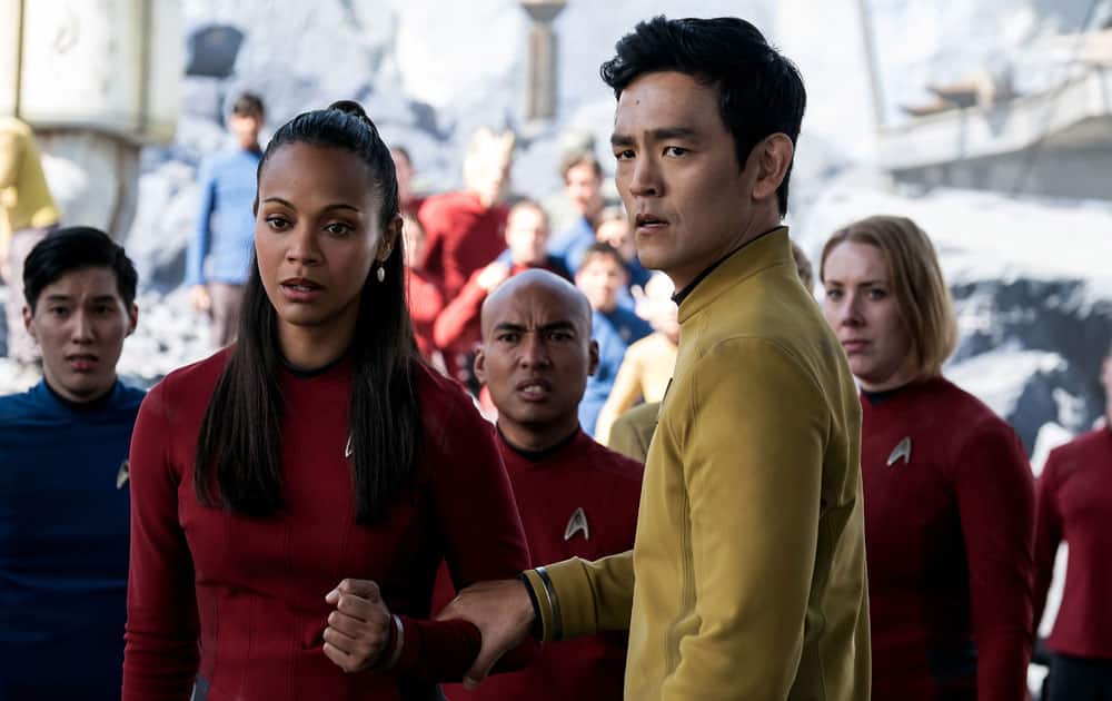 This image released by Paramount Pictures, Zoe Saldana as Uhura and John Cho as Sulu