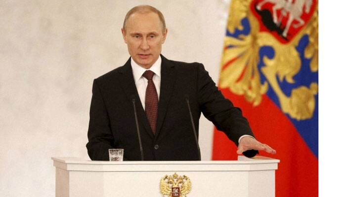 Russian President Putin calls for measures to strengthen national currency ruble