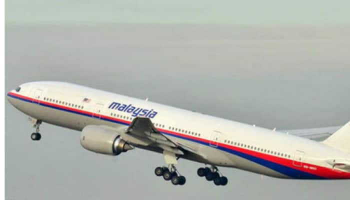 MH370 search team raises prospect plane could lie elsewhere