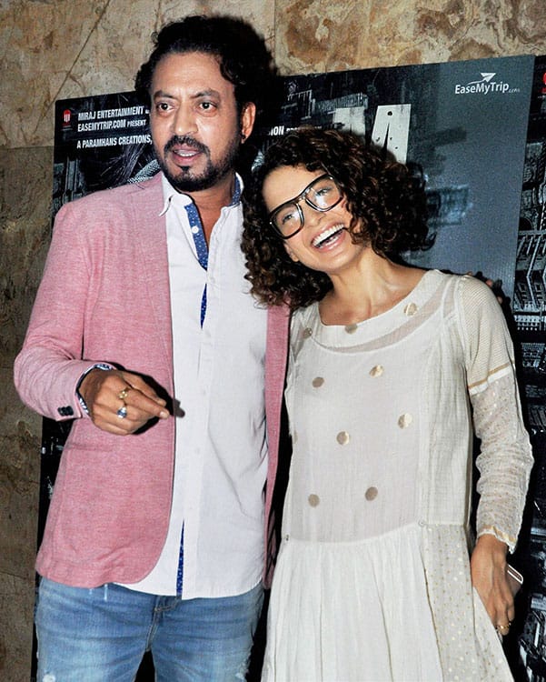 Bollywood actor Irrfan Khan poses with Kangana Ranaut