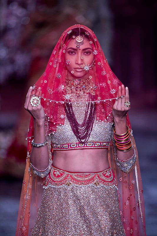 A model displays a design at the India Couture Week 