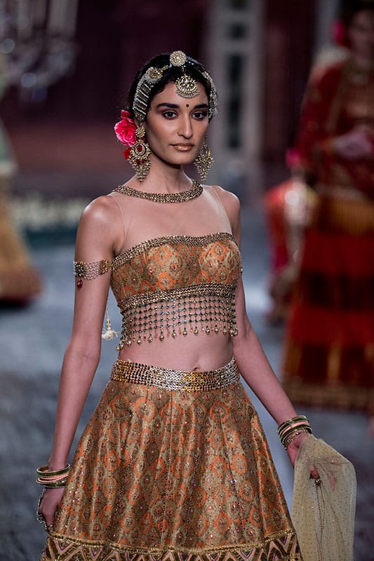 A model displays a design by Indian designer Tarun Tahiliani