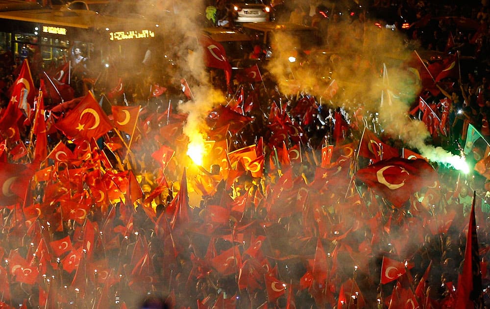 Pro-government supporters, waving Turkish flags