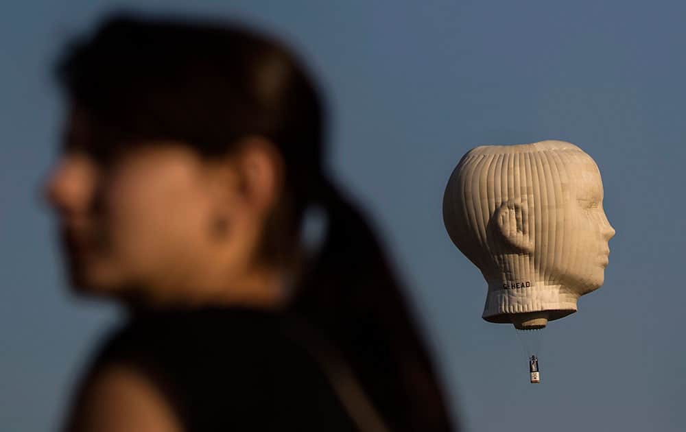 A hot air balloon takes flight during a festival in the southern Israeli city of Netivot