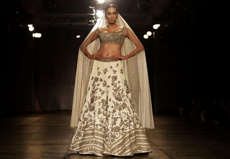 A model displays a creation by designers Rimple & Harpreet Narula