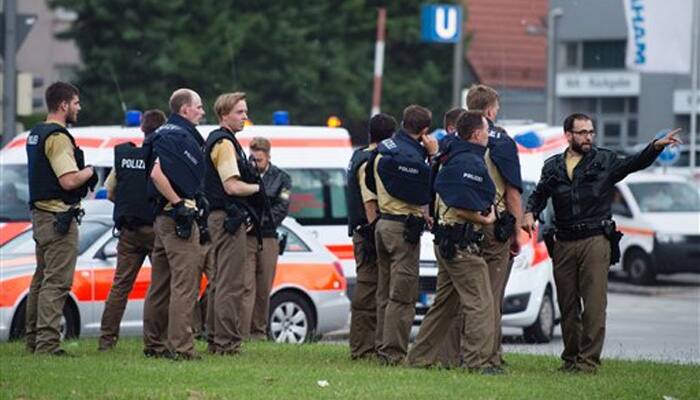 Gunmen kill at least eight in Munich shopping mall, shooters on the run