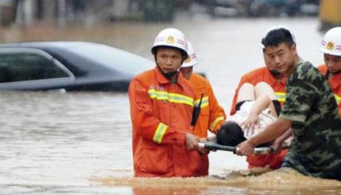 225 killed or missing in China rains; protests break out