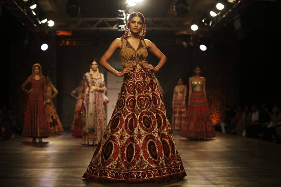 Models display creations by Indian designers Rimple & Harpreet