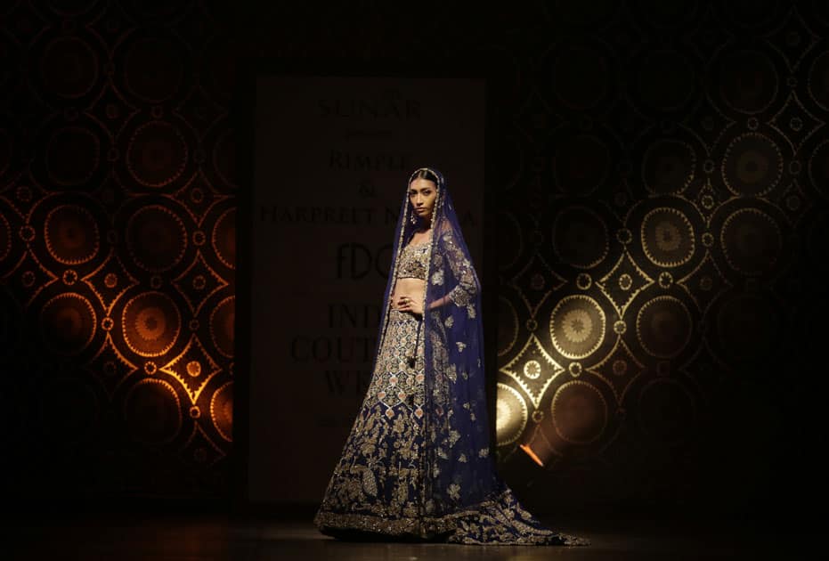 A model displays a creation by Indian designers Rimple & Harpreet