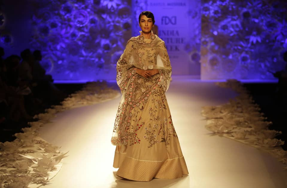 A model displays a creation by Rahul Mishra