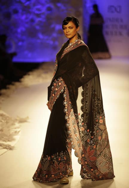 A model displays a creation by Rahul Mishra