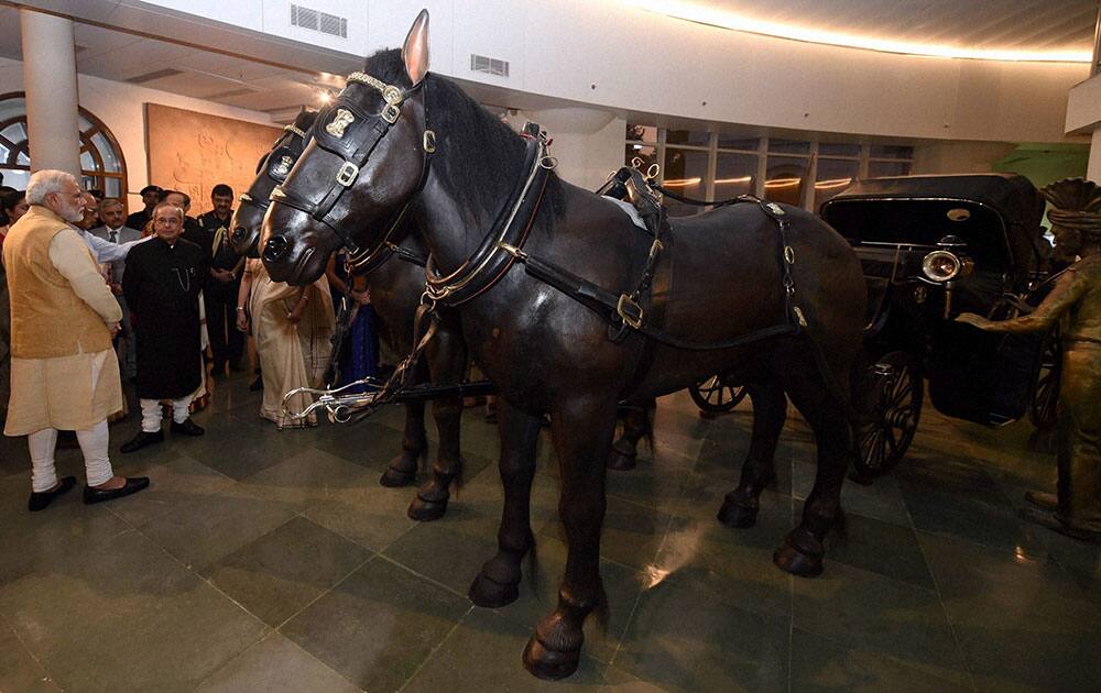 President Pranab Mukherjee with Prime Minister Narendra Modi admires one of the installations at Phase-II of the Rashtrapati Bhavan Museum President Pranab Mukherjee with Prime Minister Narendra Modi admires one of the installations at Phase-II of the Rashtrapati Bhavan Museum