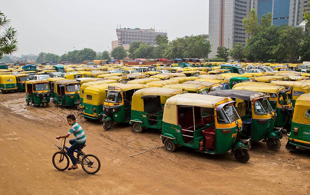 autos parked during a commercial auto and taxi strike in New Delhi autos parked during a commercial auto and taxi strike in New Delhi