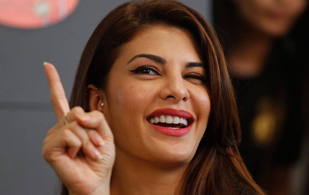 Jacqueline Fernandez gestures during a press conference to promote her upcoming movie Jacqueline Fernandez gestures during a press conference to promote her upcoming movie