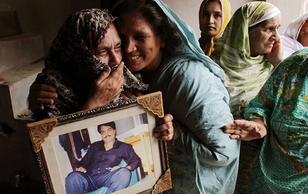 Family members of Pakistan's Zulfikar Ali celebrate as the Indonesian government halt his execution Family members of Pakistan's Zulfikar Ali celebrate as the Indonesian government halt his execution
