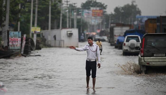 Rains bring Gurgaon and Bengaluru – shining examples of India&#039;s rise – to a grinding halt