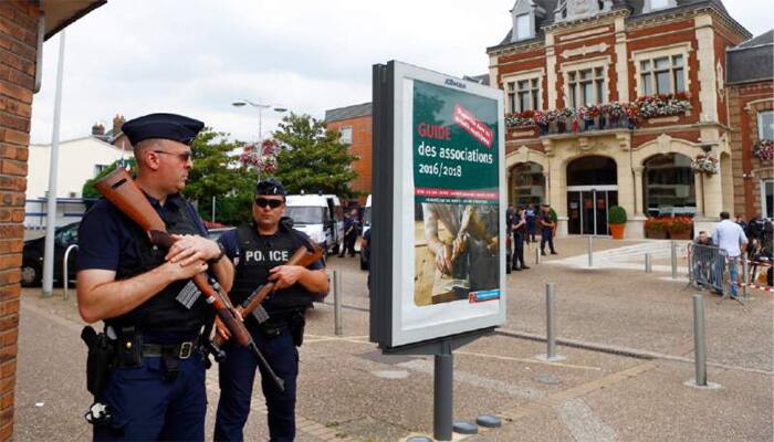 France detains Syrian refugee as church attack investigation widens